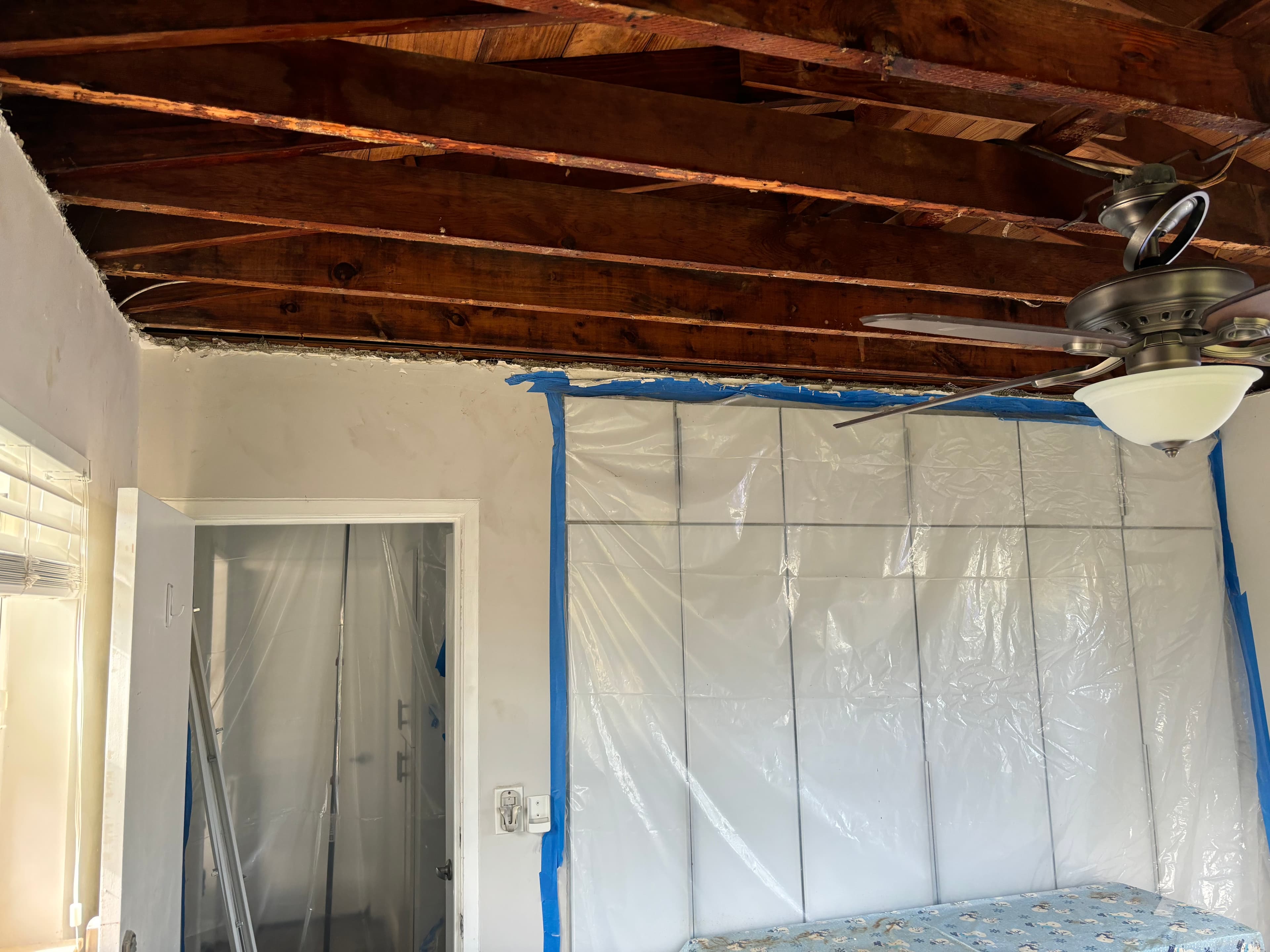 Damaged ceiling structure inside a NYC building requiring biohazard cleanup