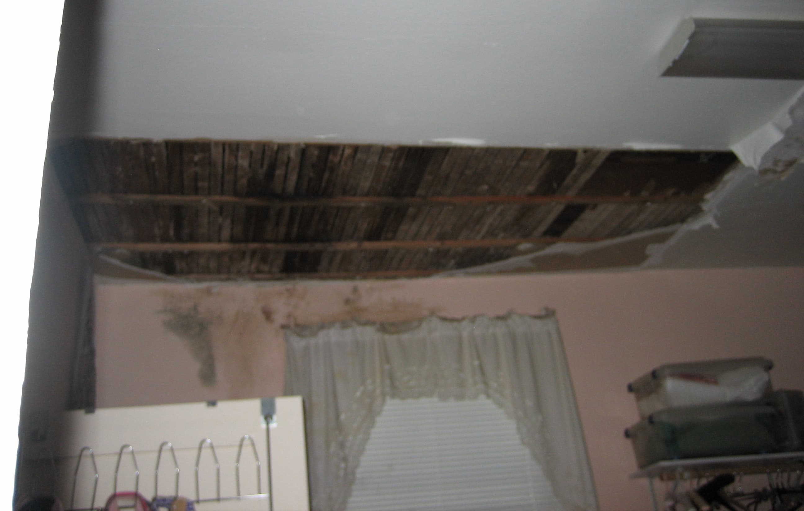 Ceiling collapse with mold damage from a NYC water intrusion event