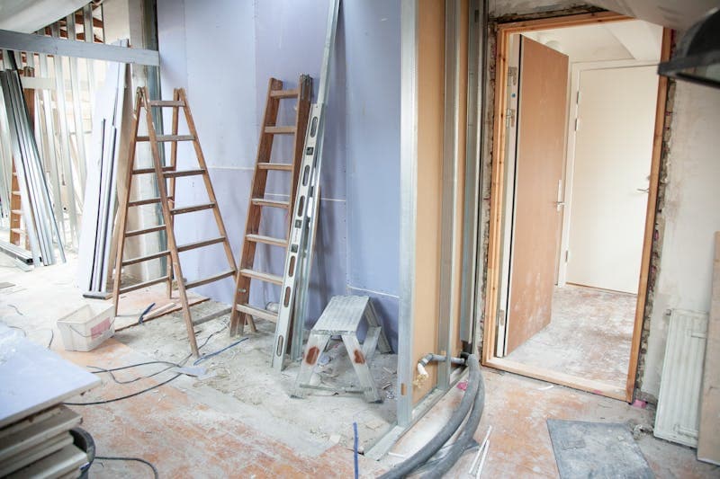 Interior rebuild in progress with new drywall during a NYC reconstruction